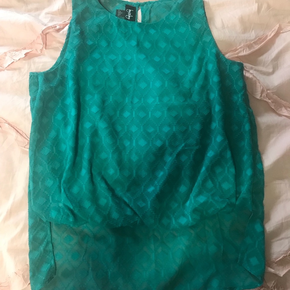 Green sleeveless shirt